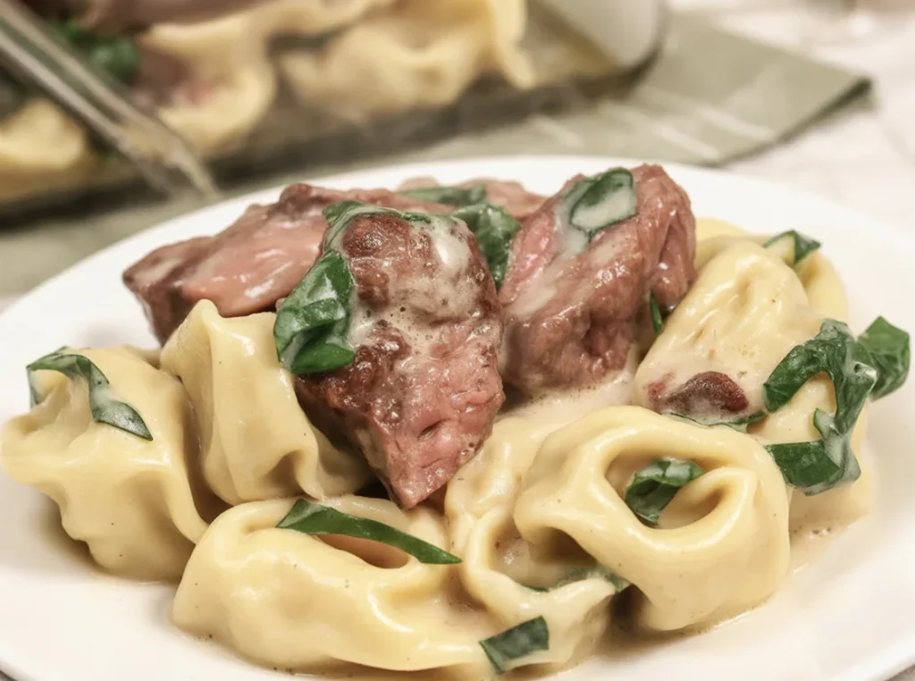 Delicious Garlic Steak Tortellini with tender steak and creamy garlic parmesan sauce.