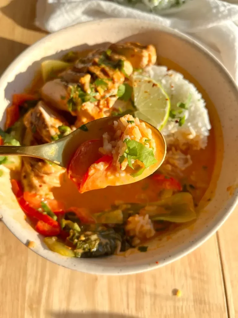 Bowl of easy Thai red curry with chicken and colorful vegetables