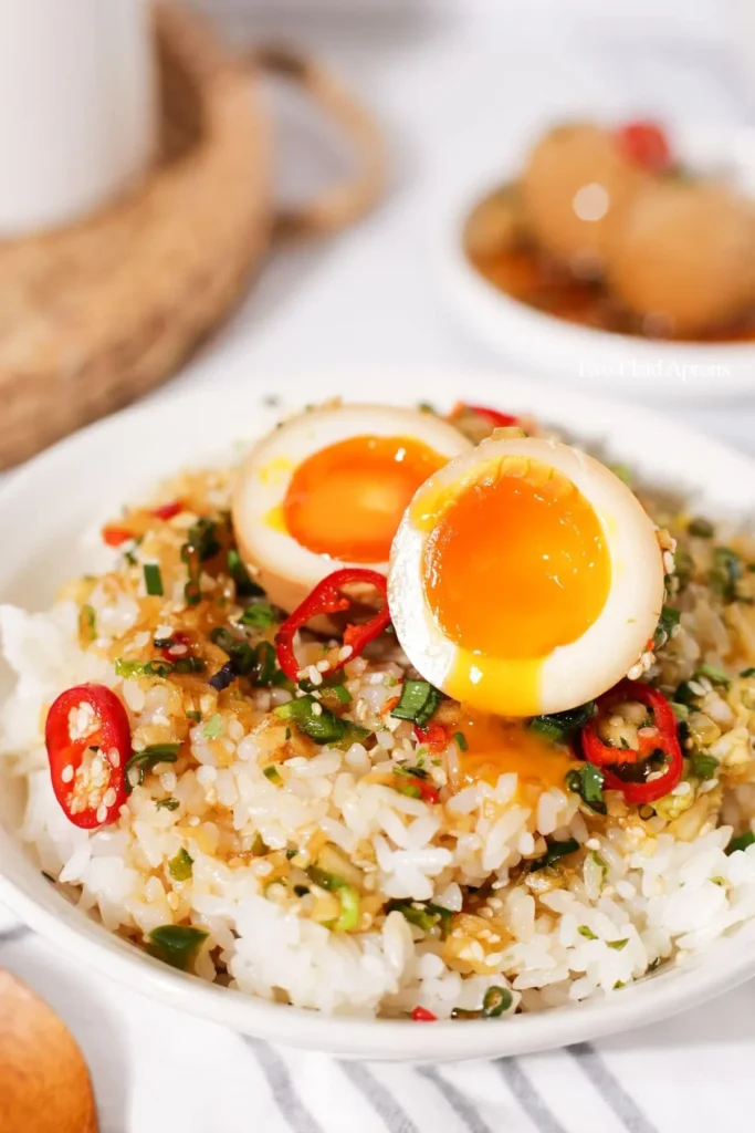 Delicious Mayak Eggs marinated in a savory soy sauce and chili blend.