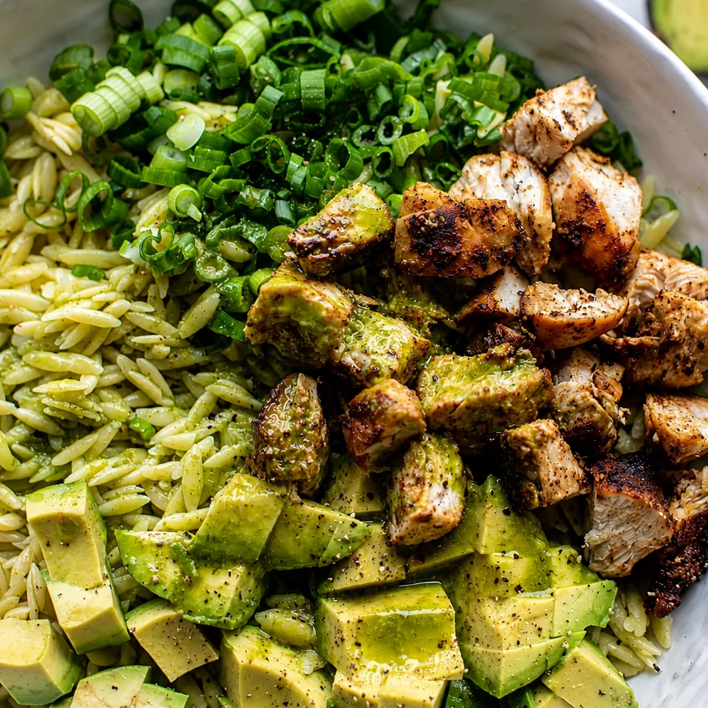 Grilled Chicken Orzo Salad with Avocado and cilantro lime vinaigrette.